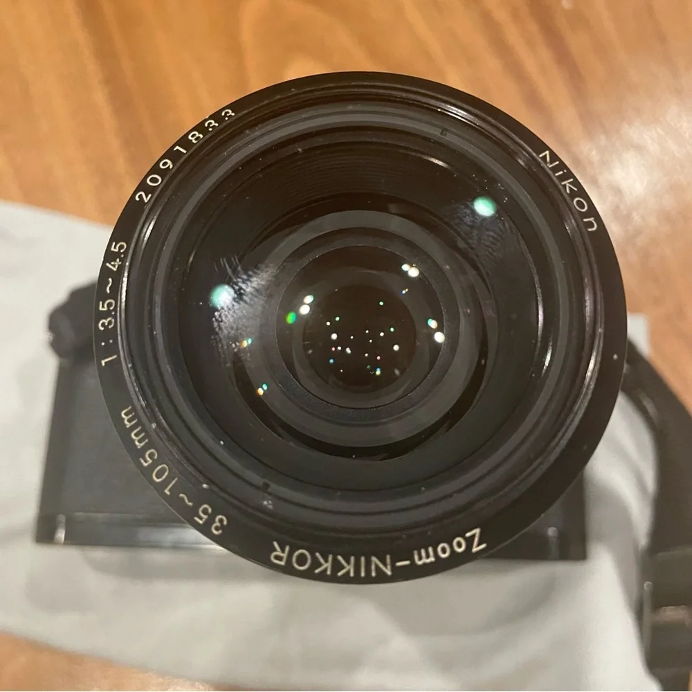 Vintage Nikon FM2 black camera with lens